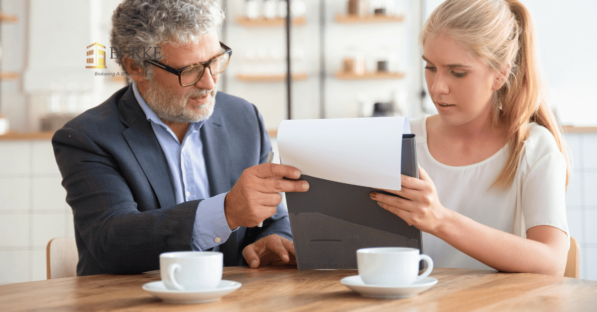 Mortgage broker in Hamilton meeting with a client to stop a Notice of Sale