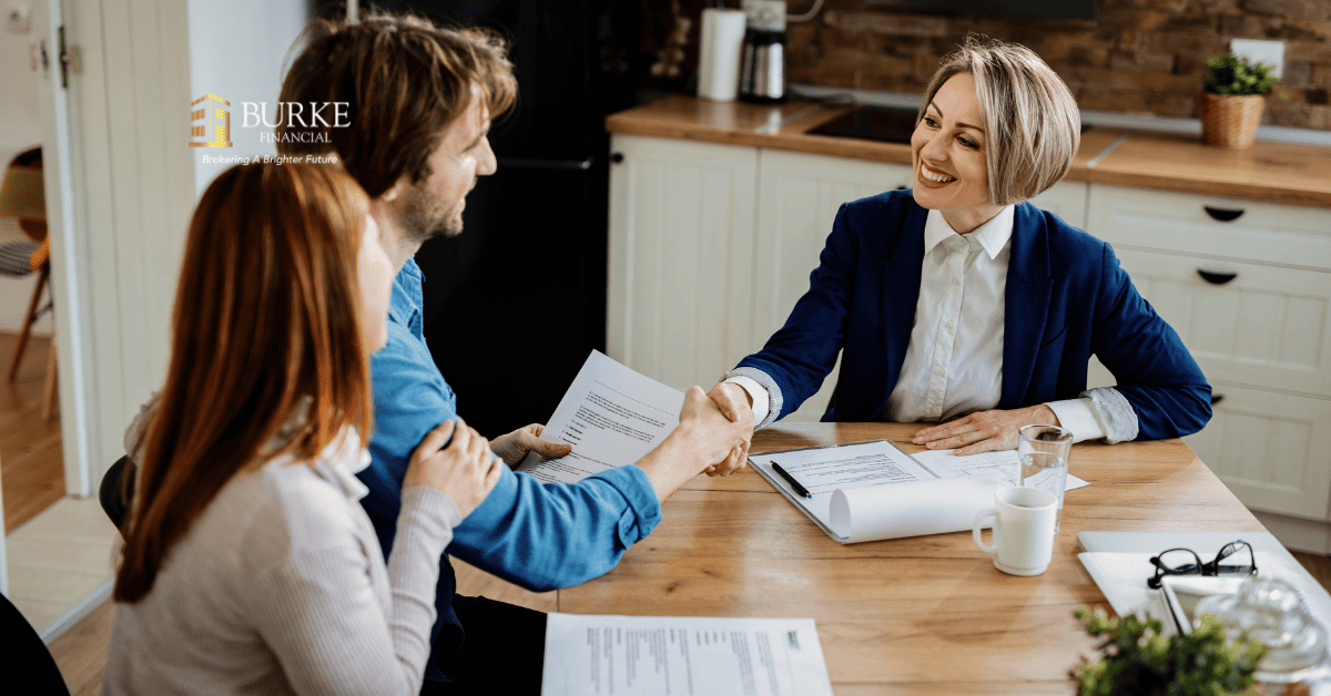Hamilton family in front of their home after stopping a Notice of Sale