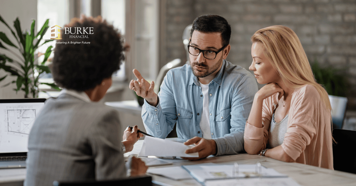 Homeowners meeting with a mortgage advisor to discuss refinancing, home equity, and options to stop a power of sale in Ontario.