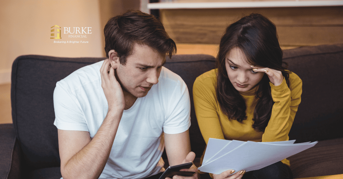 Ontario homeowner reviewing a Notice of Sale letter and mortgage documents at home