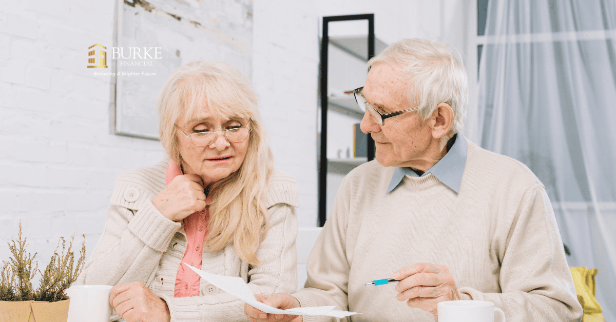 Mortgage advisor explaining a reverse mortgage payout to an older homeowner in Ontario